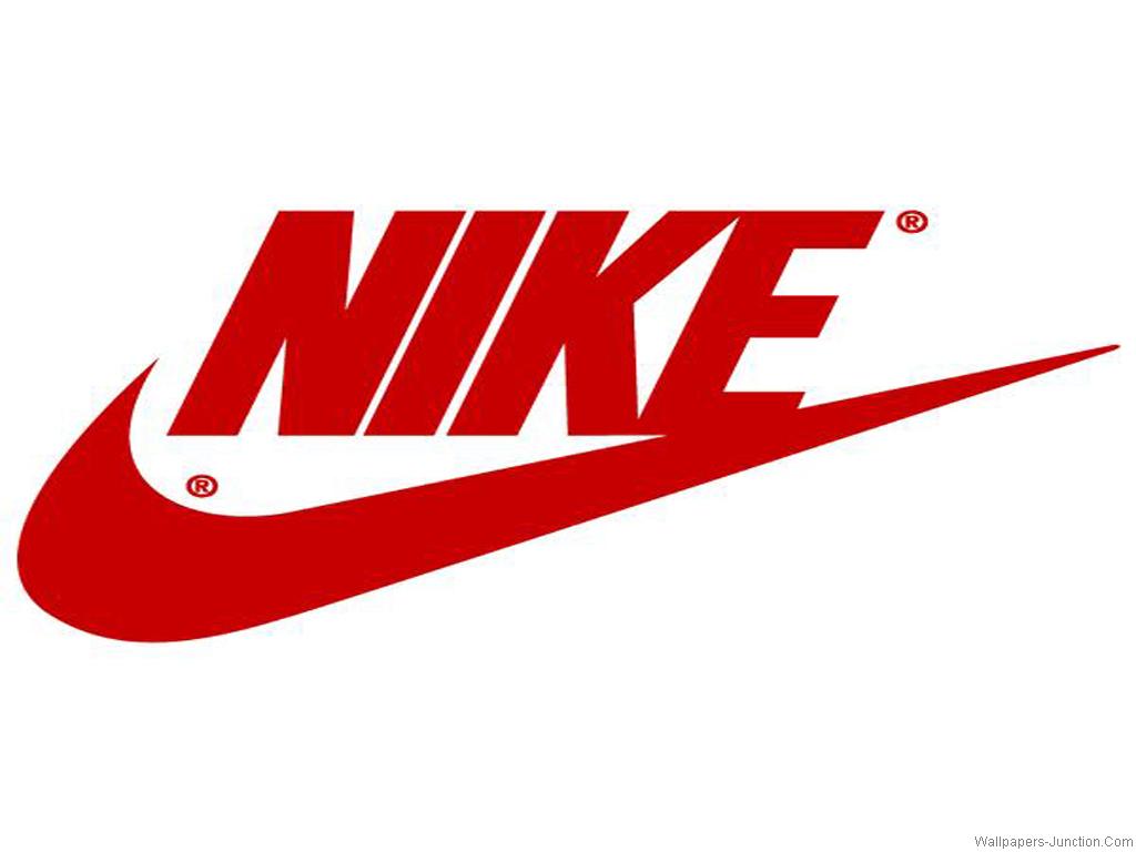 Download A Pink And White Pattern With Nike Logos Wallpaper